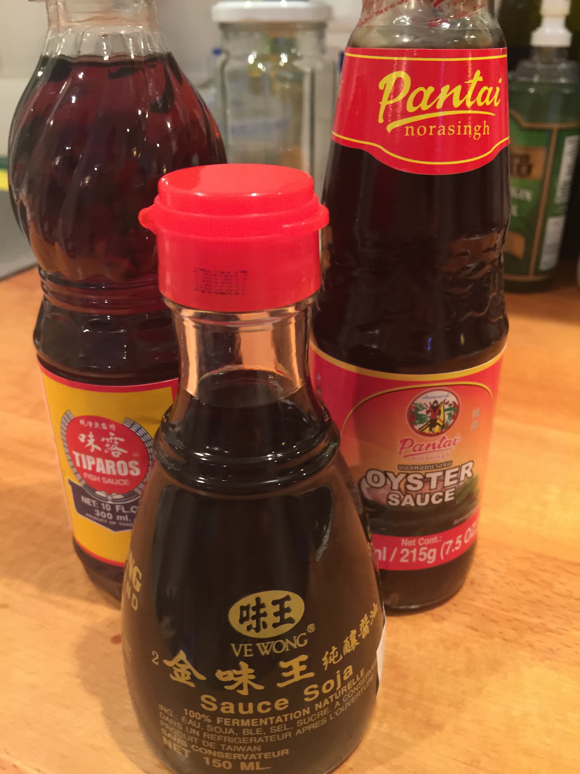 Oyster sauce, soy sauce, fish sauce, All unopened and in