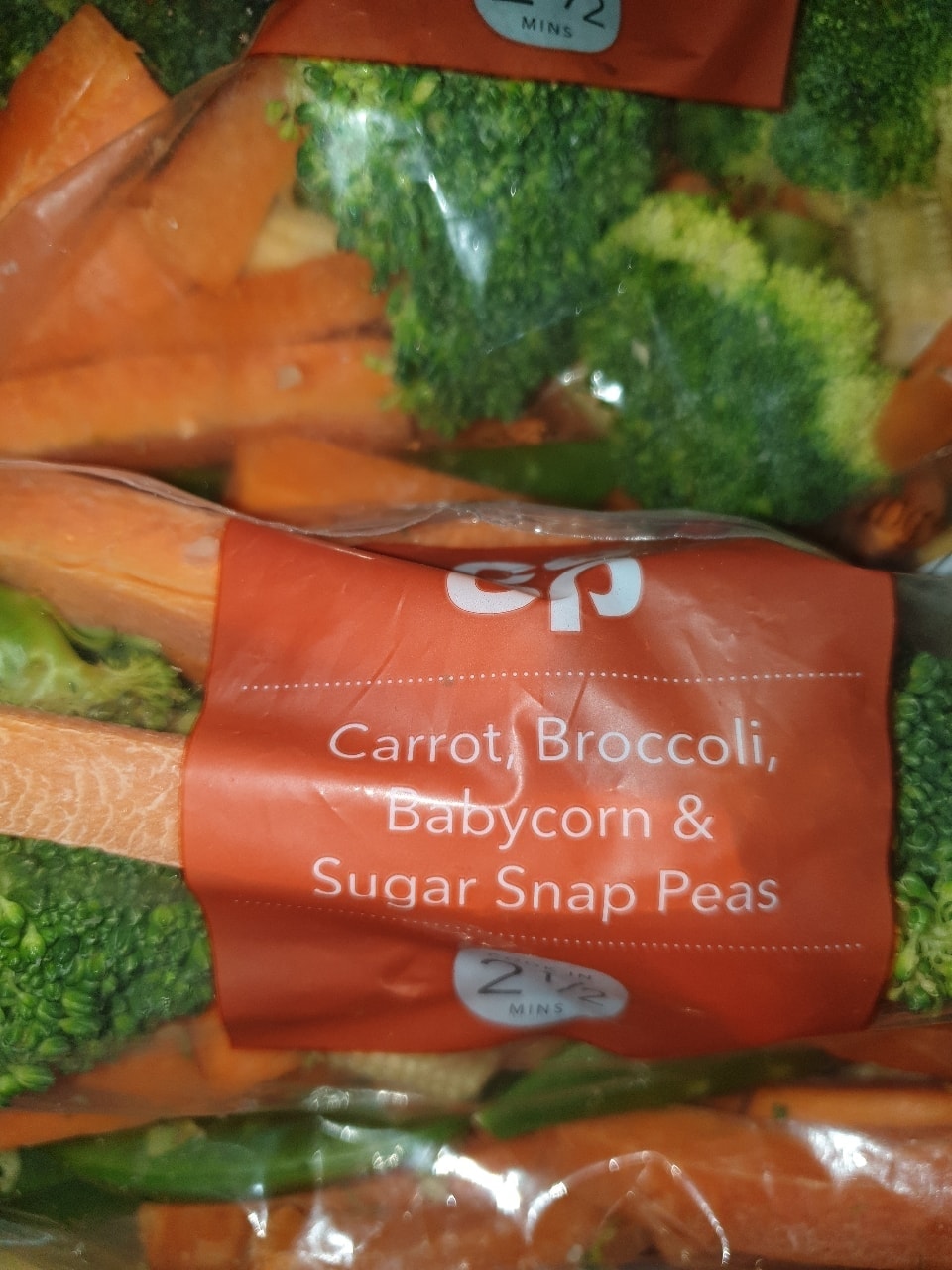 Carrot and broccoli baby corn and sugar snap peas OLIO