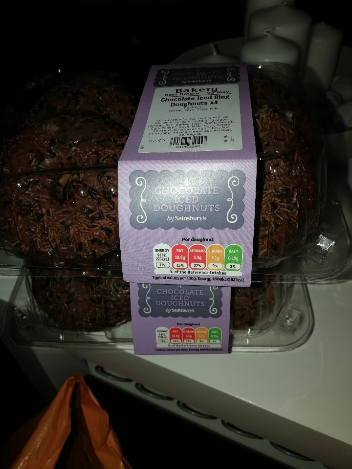 2x chocolate iced ring doughnuts 